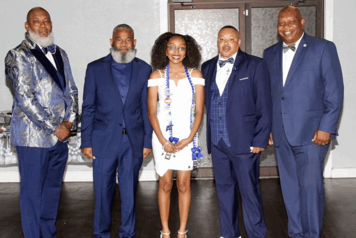 The Past Grand Master Abraham Grant Scholarship Award of $1,000 was presented to Kylin Bain during the 3rd Annual Blue Banquet. (Photo by Bro. Tostey Bass)